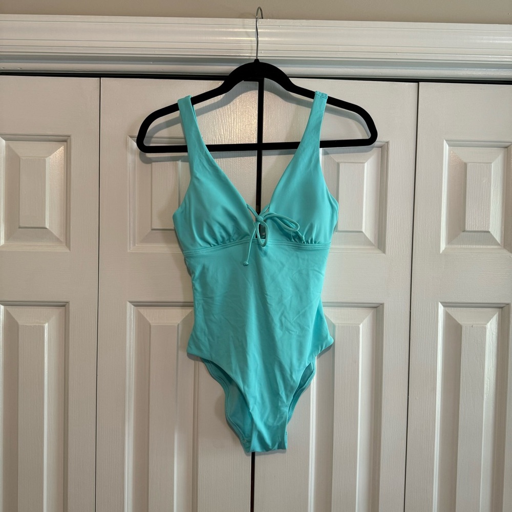 Aqua green one piece, tie front, decorative back, removable bra lining, Size S